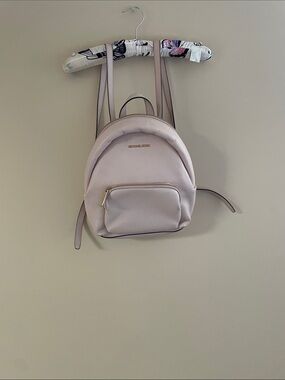 Michael Kors blush pink leather Backpack.